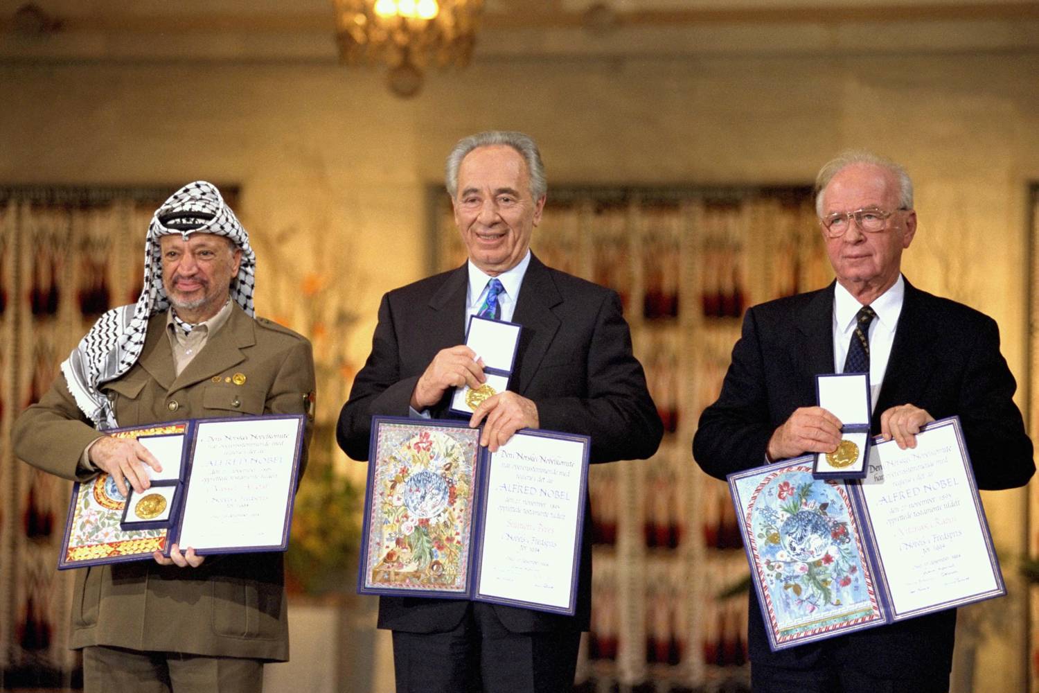 The Nobel Peace Prize laureates for 1994 in Oslo. From left to right: PLO Chairman Yasser Arafat, Israeli Foreign Minister Shimon Peres, Israeli Prime Minister Yitzhak Rabin. Photo: Saar Yaacov, Israeli Government Press Office